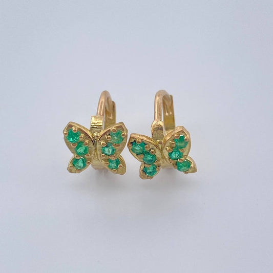 Candongas Mariposa Esmeraldas 1.7gr / 1cm / Oro Amarillo 18K $