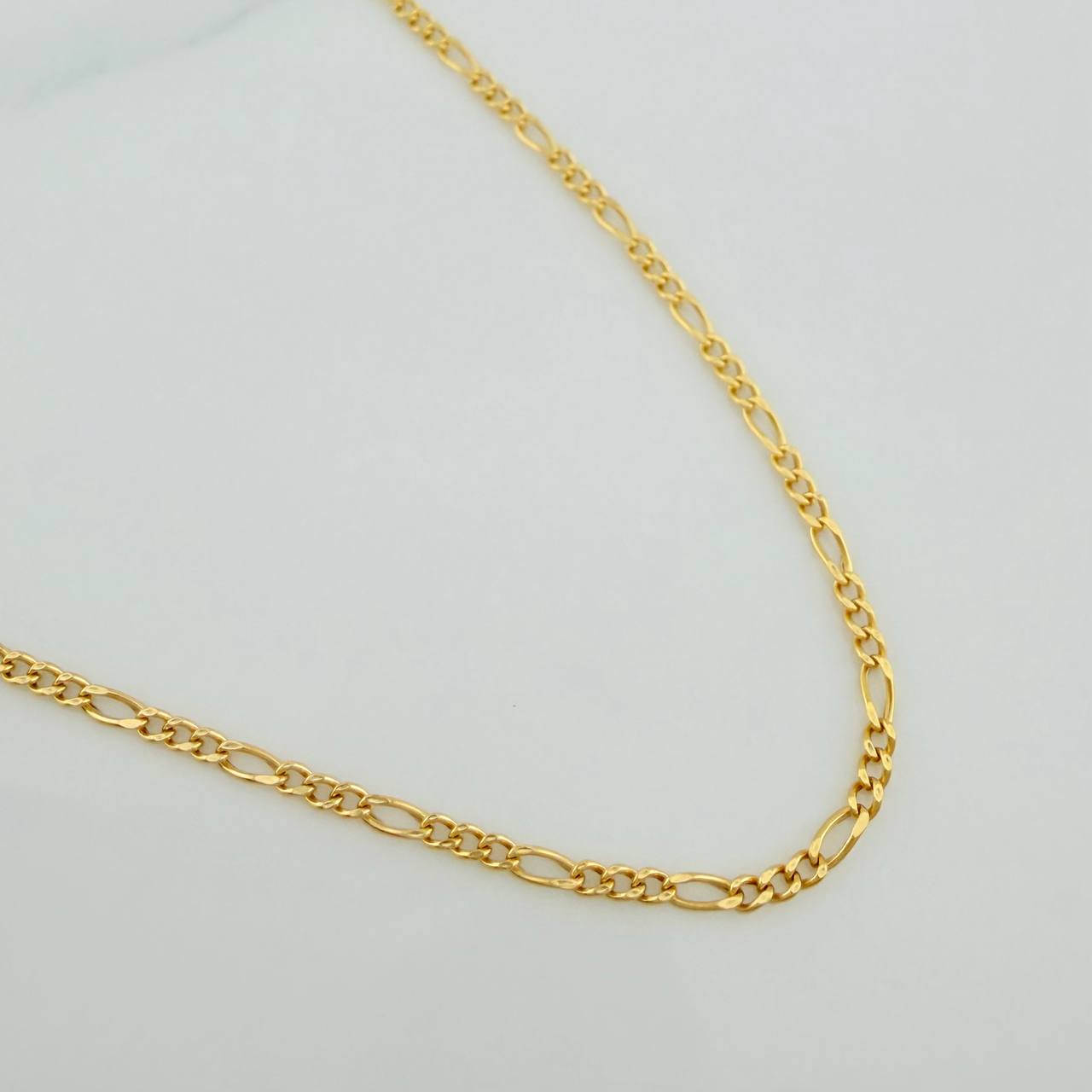Cadena Figaro 1.35gr / 44.5cm / 1.35mm Oro Amarillo +1 18K %