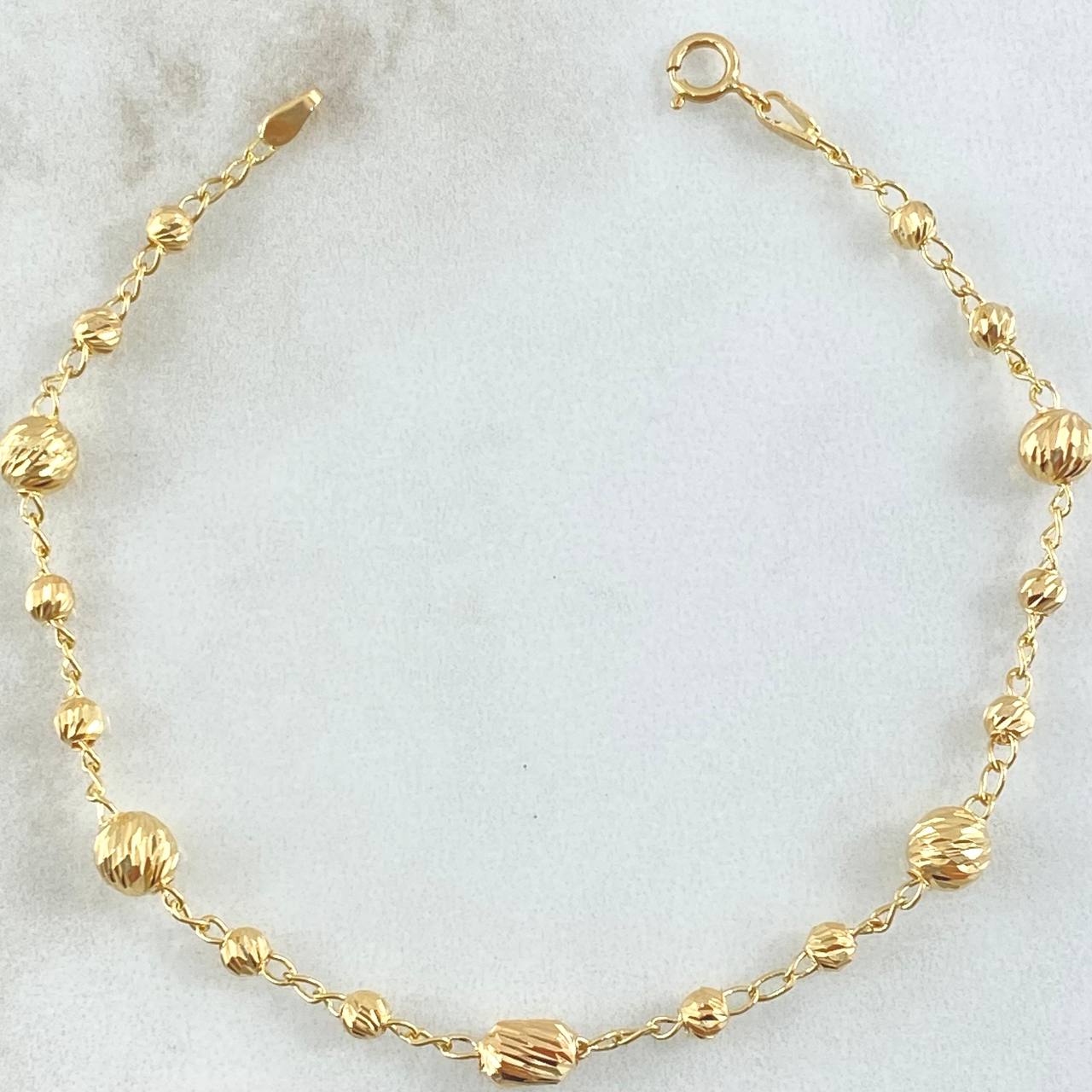 Pulso Espiga Militar 2.65gr / 17.5cm / 3mm-5mm Bolas Diamantadas Oro Amarillo 18K ©