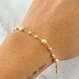 Pulso Espiga Militar 2.65gr / 17.5cm / 3mm-5mm Bolas Diamantadas Oro Amarillo 18K ©