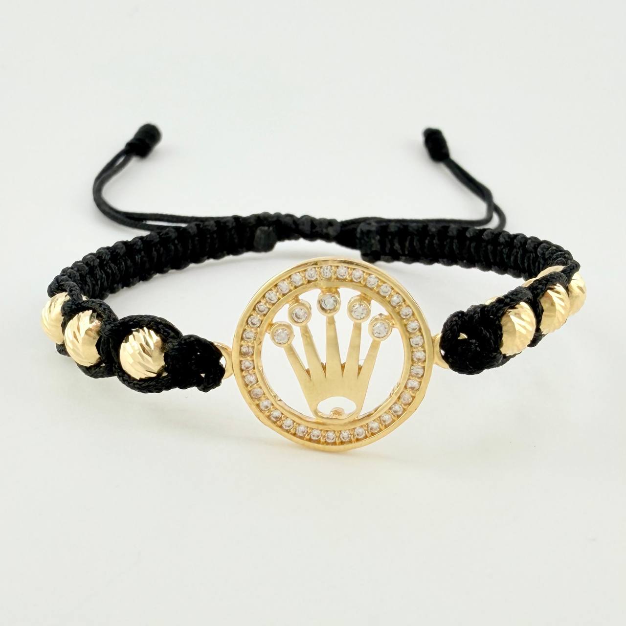 Pulsera Tejida Negra Circulo Corona Bolas Diamantadas Oro Amarillo 18K