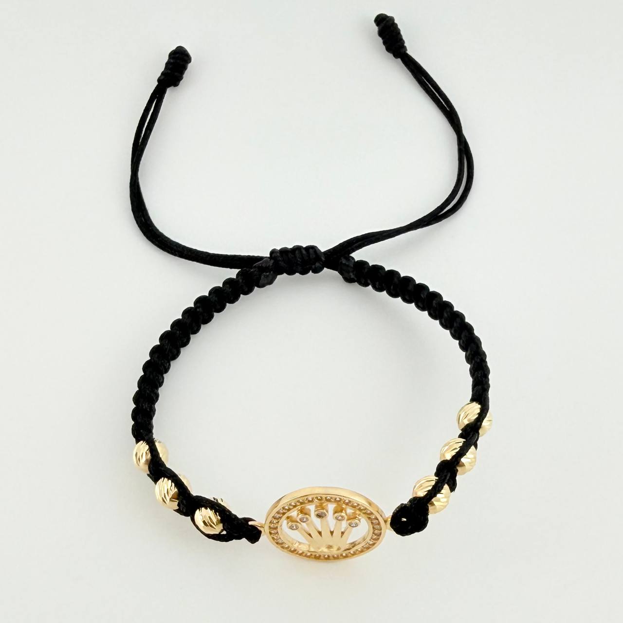 Pulsera Tejida Negra Circulo Corona Bolas Diamantadas Oro Amarillo 18K