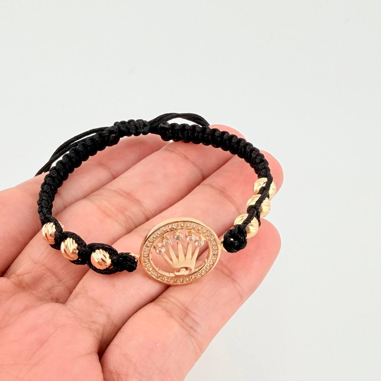 Pulsera Tejida Negra Circulo Corona Bolas Diamantadas Oro Amarillo 18K