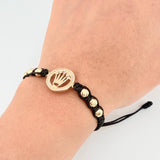Pulsera Tejida Negra Circulo Corona Bolas Diamantadas Oro Amarillo 18K