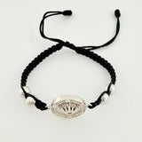 Pulsera Tejida Negra Circulo Corona Bolas Diamantadas Oro Blanco 18K
