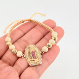 Pulsera Tejida Beige Virgen de Guadalupe Bolas Diamantadas Oro Amarillo 18K