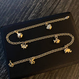 Tobillera Aro Seguido 3.5gr / 25cm "Abeja-Elefante-Pez-Mariposa-Mariquita-Oso" Oro Amarillo