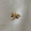 Dije Mariposa 0,65gr Circones Azules Blancos Oro Amarillo