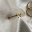Anillo Moño 1.25gr-T6 1/4 Circones Blancos Oro Amarillo