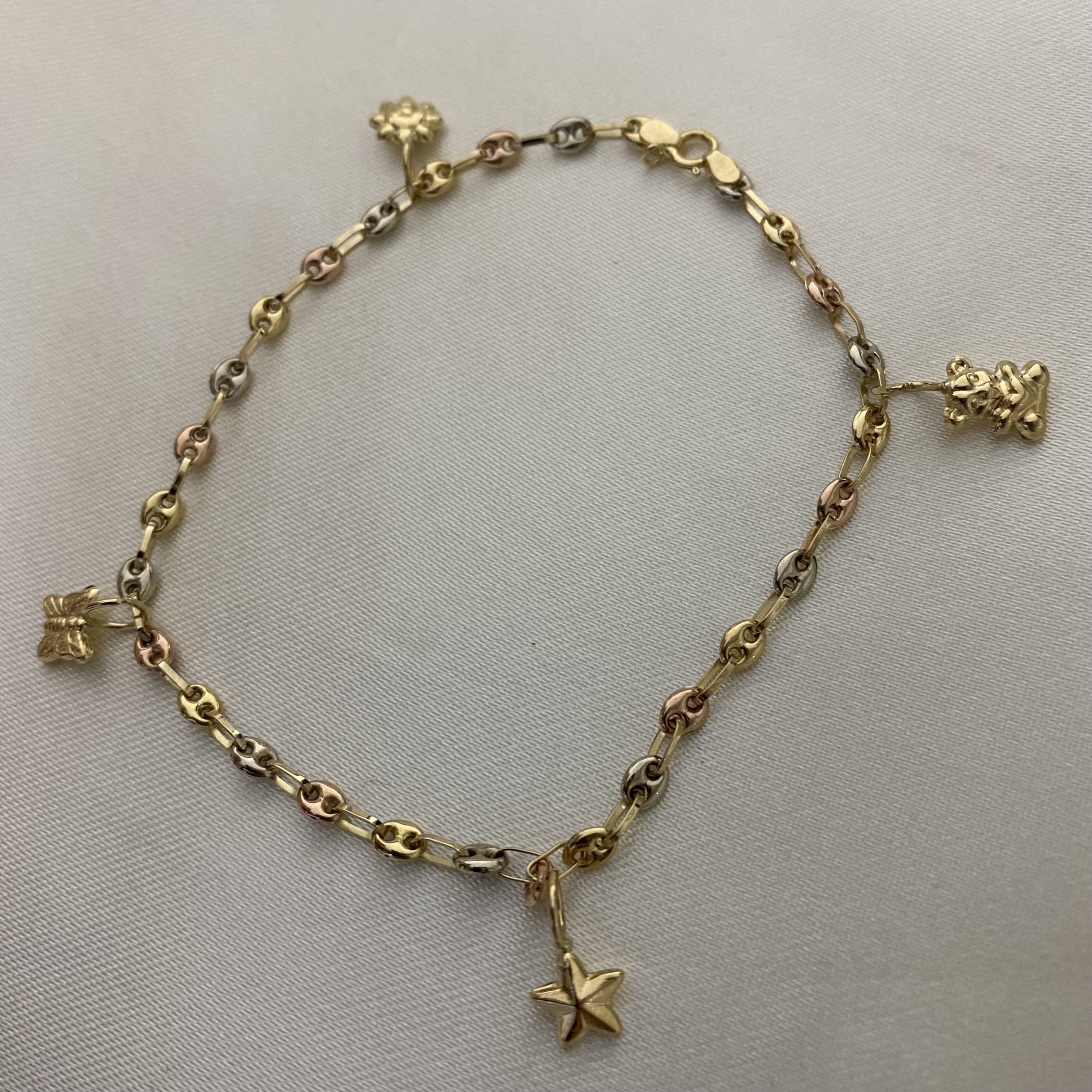 Pulso GC 3.35gr/19cm Decorada "Oso-Estrella-Mariposa-Sol" Tres Oros