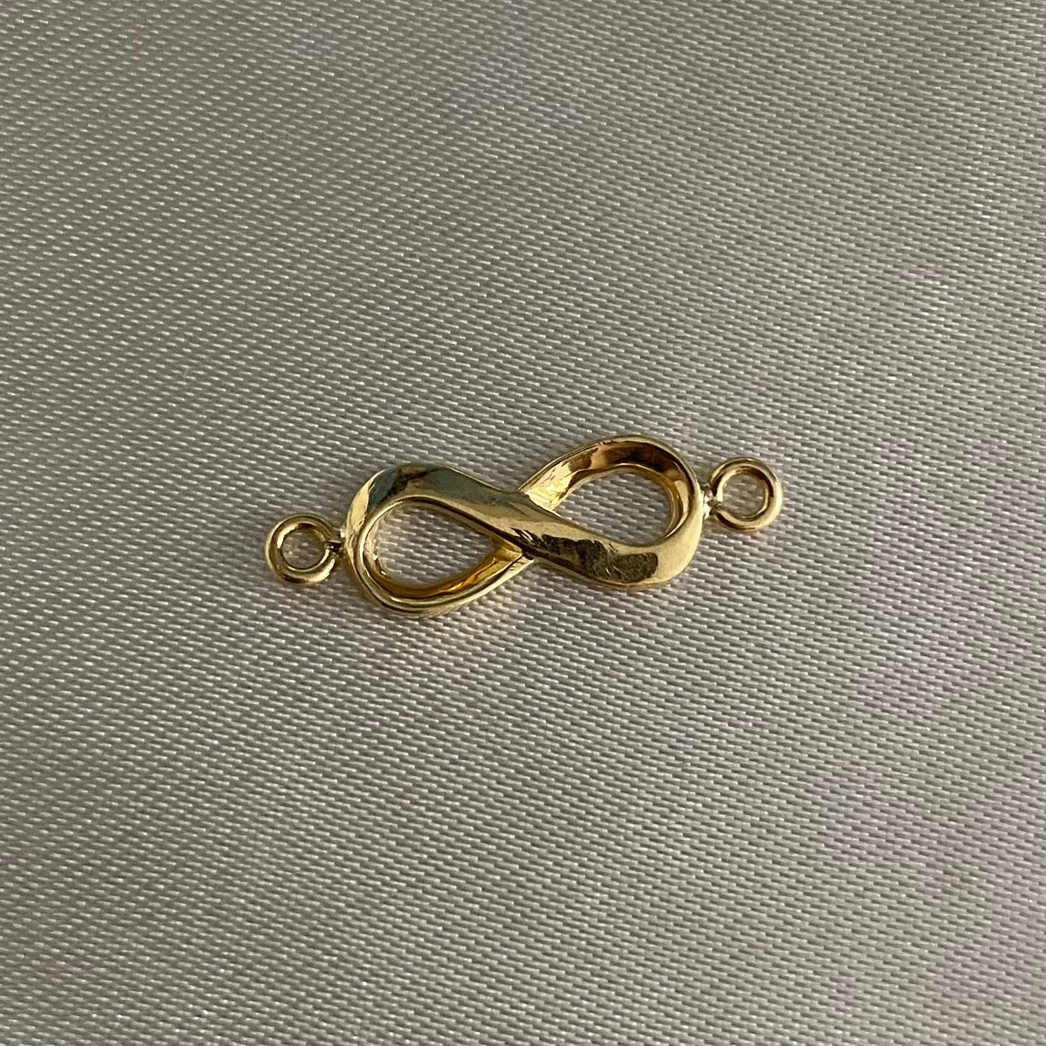 Herraje Infinito 1.15gr Oro Amarillo