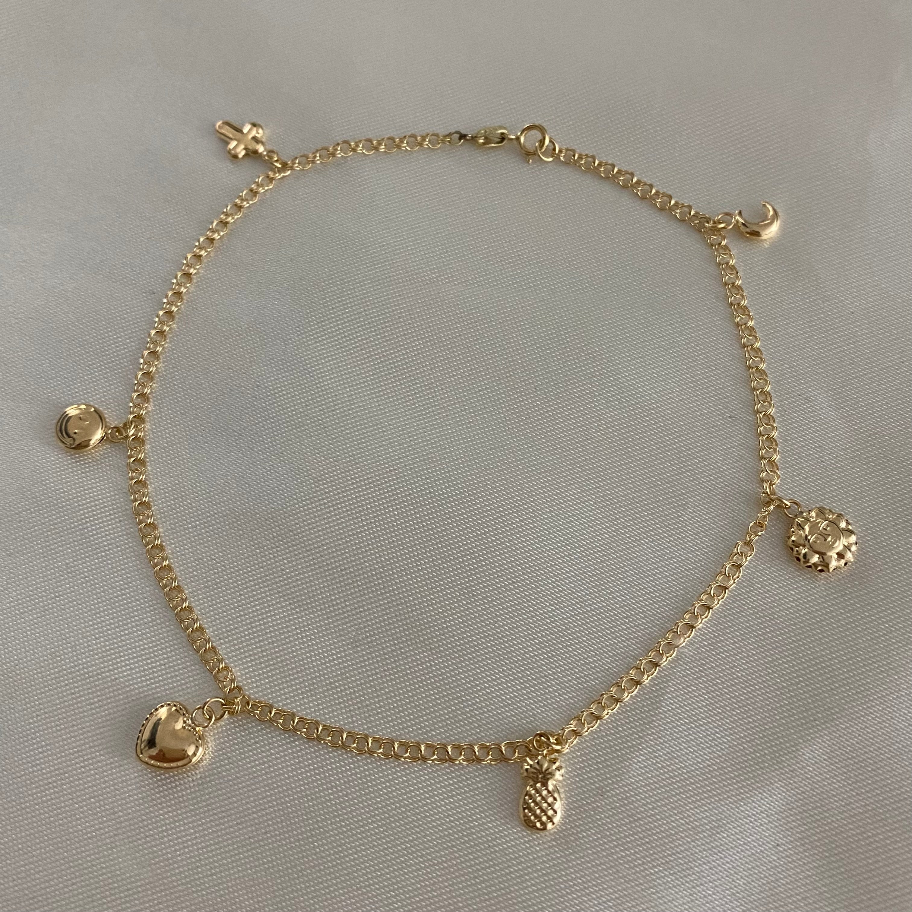 Tobillera Aro Seguido 3.35gr/26cm "LUNA-SOL-CORAZON-CARITA-CRUZ" Oro Amarillo