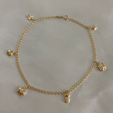 Tobillera Aro Seguido 3.35gr/26cm "LUNA-SOL-CORAZON-CARITA-CRUZ" Oro Amarillo