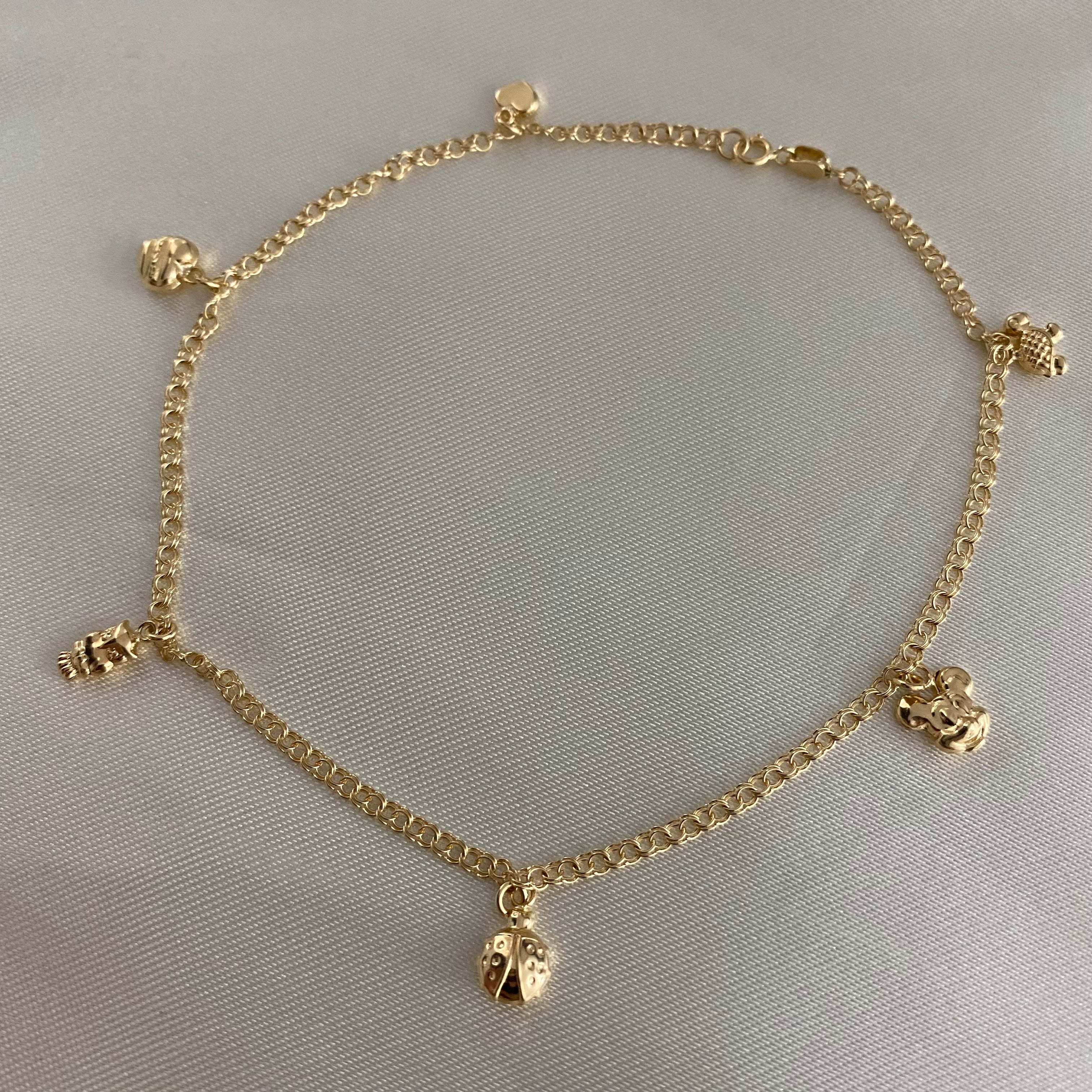 Tobillera Aro Seguido 3.45gr/26cm "CORAZON-BUHO-MARIQUITA-MICKEY-TORTUGA" Oro Amarillo