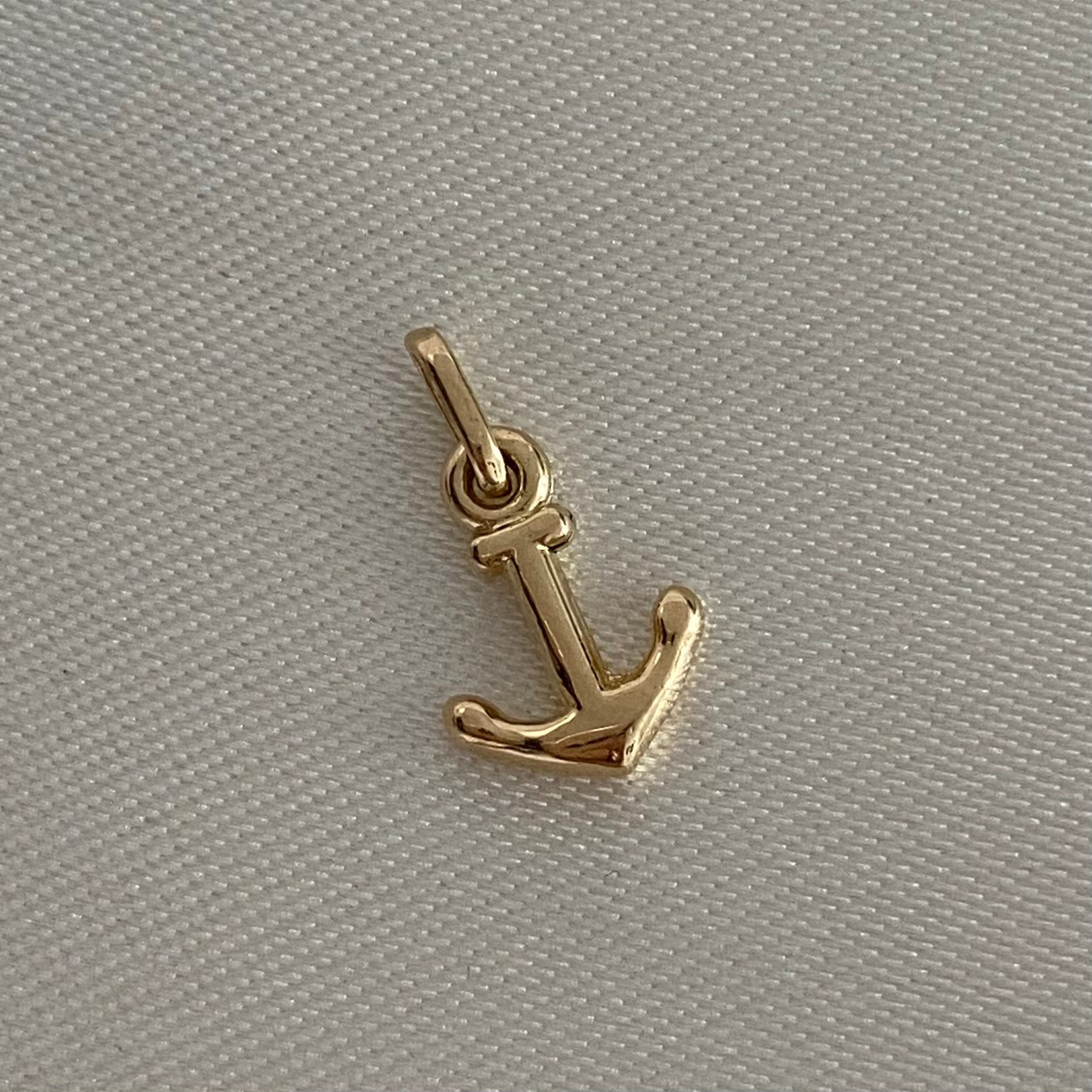 Dije Ancla 0.9gr Oro Amarilo