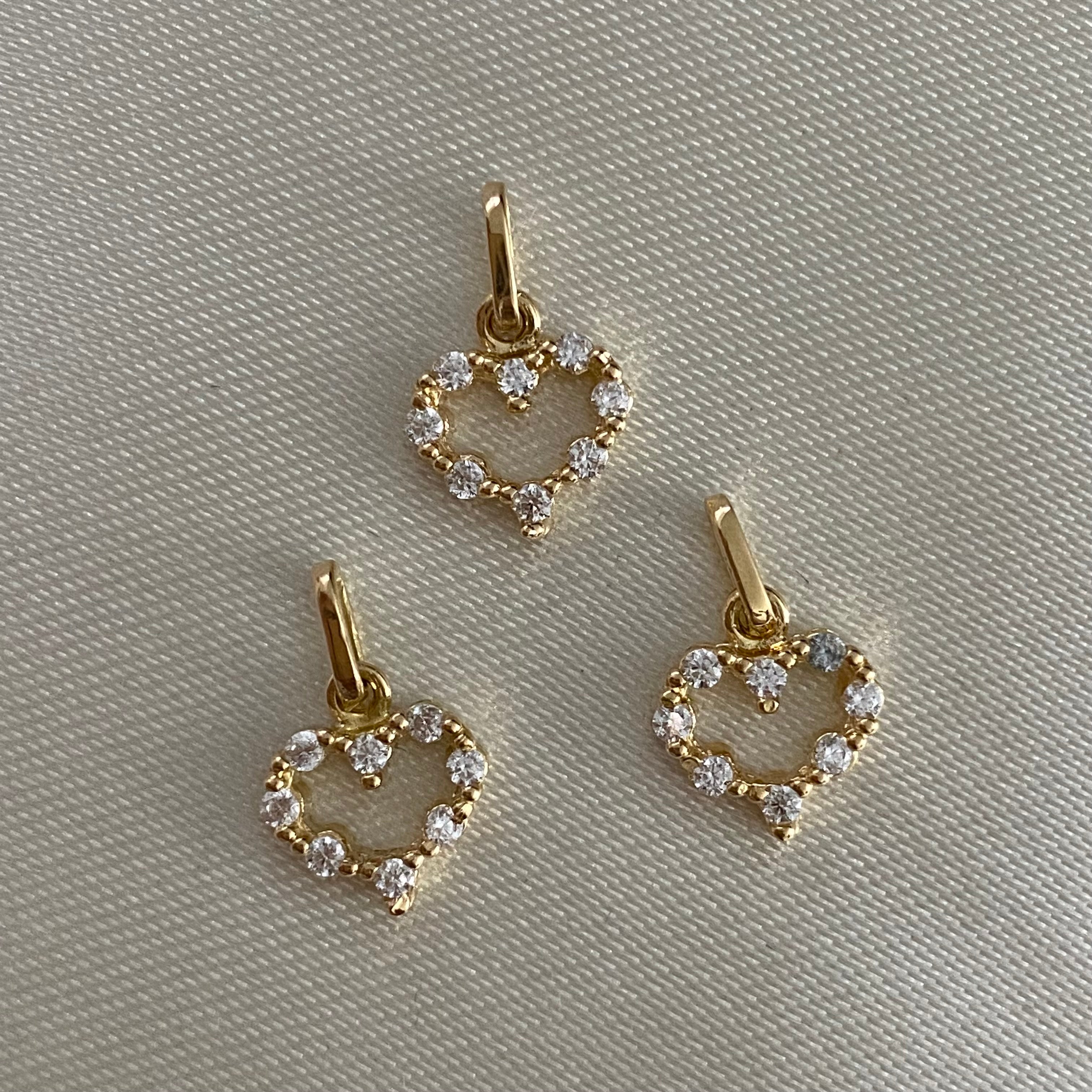 Dije Corazon 0.7gr Oro Amarilo Circones Blancos