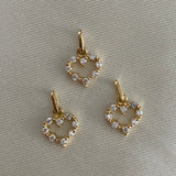 Dije Corazon 0.7gr Oro Amarilo Circones Blancos