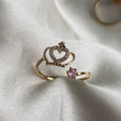 Anillo Corona 1.35gr - T7 1/2 Abrazo Oro Amarillo Circones Rosa Blancos