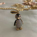 Dije Pinguino 8.2 gr Oro Amarillo Circones Blancos Negros