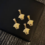 Dije VS Medusa 0.55gr/1.5cm Oro Amarillo*