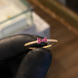 Anillo Corbatin 1.3gr-T9 1/2 Circones Blancos Fucsias Oro Amarillo .