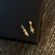 Dije Niña 0.45gr / 1.6cm Circones Blancos Oro Amarillo*