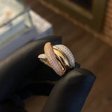 Anillo Rustico Curvas Cruzadas 6.65gr T6 3/4 Circones Blancos Tres Oros*