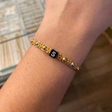 Pulsera Caqui Letra S Seis Pasos Bolas 4mm Lisas Tres Oros*