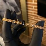 Pulsera Caqui Letra S Seis Pasos Bolas 4mm Lisas Tres Oros*