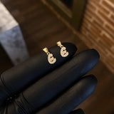 Dije Letra E 0.4gr / 1.3gr Circones Blancos Oro Amarillo