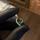 Dije Corazon Silueta 2gr / 2.3cm Esmeralda 45pts Diamantes 10pts Oro Amarillo (Joya)