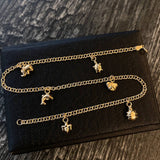 Tobillera Aro Seguido 3.55gr / 26.5cm / 2.3mm "Tortuga-Elefante-Delfin-Oso-Tortuga-Abeja" Oro Amarillo