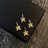 Dije Mariposa 0.35gr / 1.2cm Tupido Circones Blancos Oro Amarillo*