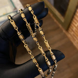 Cadena Rustica CT VS 11.1gr / 60cm Cauchos Negros Oro Amarillo