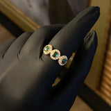 Anillo 3.35gr / T7 1/2 Circones Blancos Verdes Oro Amarillo*