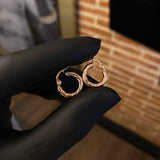 Candongas 1.2gr / 1.5cm Espiral Oro Rosa Emmi