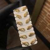 Topos Alas 0.75gr Troquelada Oro Amarillo