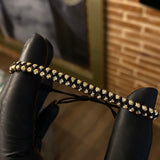 Pulsera Negra Correa Zig-zag Bolas 3mm Diamantadas Oro Amarillo*