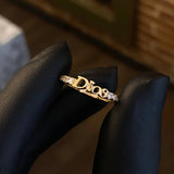 Anillo Dios 1.85gr T5 3/4 Circones Blancos Oro Amarillo
